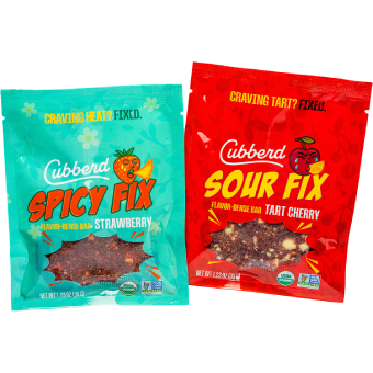 Two Cubberd snack packages, one spicy and one sour, on a white background.